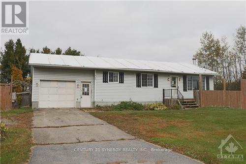 548 Highway 15, Rideau Lakes, ON - Outdoor With Facade