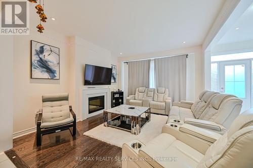 249 Inspire Boulevard, Brampton, ON - Indoor Photo Showing Living Room With Fireplace