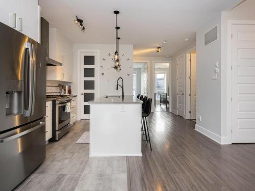 Cuisine - 1077 Rue Marcel-De La Sablonnière, Terrebonne (Terrebonne), QC - Indoor Photo Showing Kitchen With Upgraded Kitchen