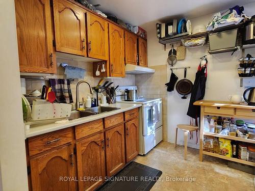 Upper-132 Portland St, Toronto, ON - Indoor Photo Showing Kitchen With Double Sink