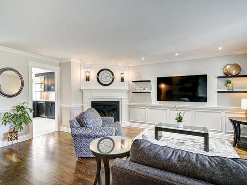 Salon - 3 Av. Des Sorbiers, Bois-Des-Filion, QC - Indoor Photo Showing Living Room With Fireplace