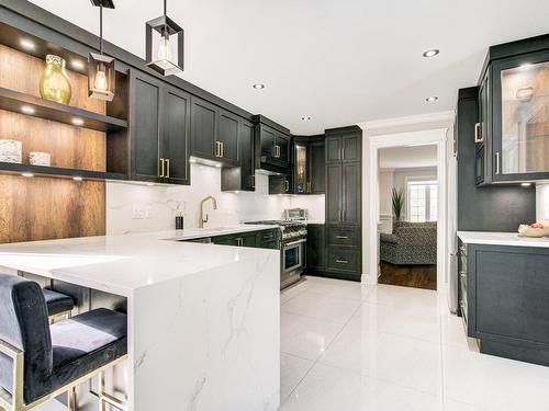 Cuisine - 3 Av. Des Sorbiers, Bois-Des-Filion, QC - Indoor Photo Showing Kitchen With Upgraded Kitchen