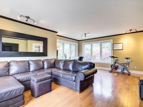 Salle familiale - 3 Av. Des Sorbiers, Bois-Des-Filion, QC - Indoor Photo Showing Living Room