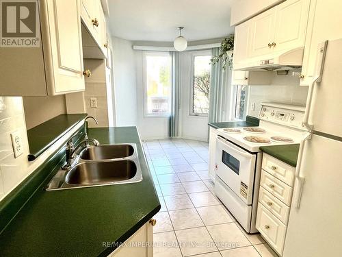 1012 - 28 Rosebank Drive, Toronto, ON - Indoor Photo Showing Kitchen With Double Sink