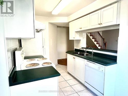 1012 - 28 Rosebank Drive, Toronto, ON - Indoor Photo Showing Kitchen With Double Sink