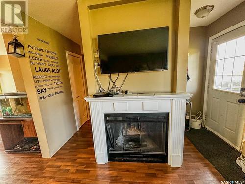 217 Cottonwood Crescent, Churchbridge, SK - Indoor Photo Showing Living Room With Fireplace