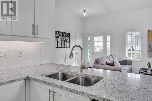 204 - 295 Densmore Road, Cobourg, ON - Indoor Photo Showing Kitchen With Double Sink