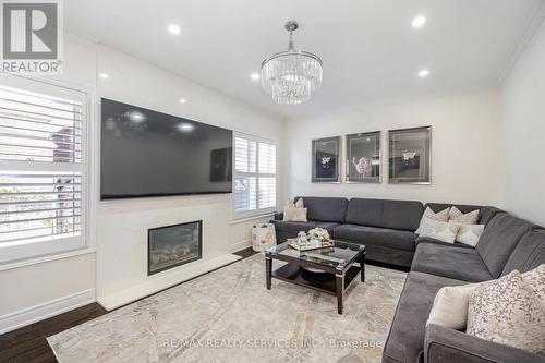 81 Birch Tree Trail, Brampton, ON - Indoor Photo Showing Living Room With Fireplace