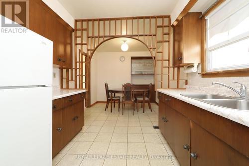 223 Rosemount Avenue, Toronto, ON - Indoor Photo Showing Kitchen With Double Sink