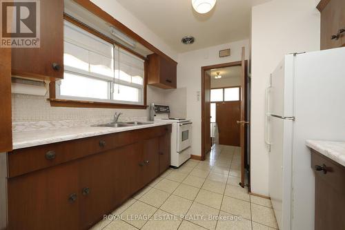 223 Rosemount Avenue, Toronto, ON - Indoor Photo Showing Kitchen With Double Sink