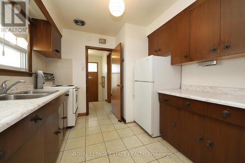 223 Rosemount Avenue, Toronto, ON - Indoor Photo Showing Kitchen With Double Sink