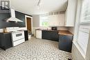 41 Charlotte Street, Sackville, NB  - Indoor Photo Showing Kitchen With Double Sink 