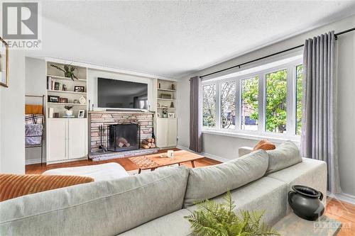 1449 Charlebois Avenue, Ottawa, ON - Indoor Photo Showing Living Room With Fireplace