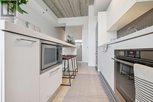 303 - 41 Ossington Avenue, Toronto, ON - Indoor Photo Showing Kitchen