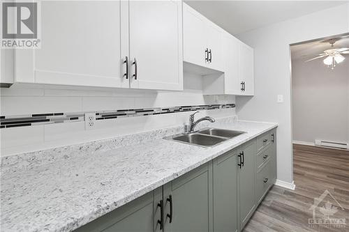 1100 Millwood Avenue Unit#309, Brockville, ON - Indoor Photo Showing Kitchen With Double Sink