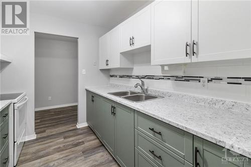 1100 Millwood Avenue Unit#309, Brockville, ON - Indoor Photo Showing Kitchen With Double Sink