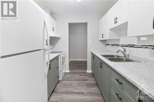 1100 Millwood Avenue Unit#309, Brockville, ON - Indoor Photo Showing Kitchen With Double Sink