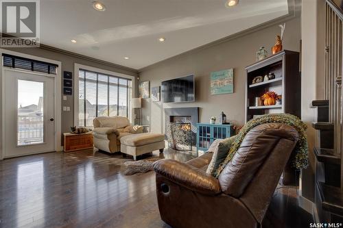 814 Rock Hill Lane, Martensville, SK - Indoor Photo Showing Living Room With Fireplace