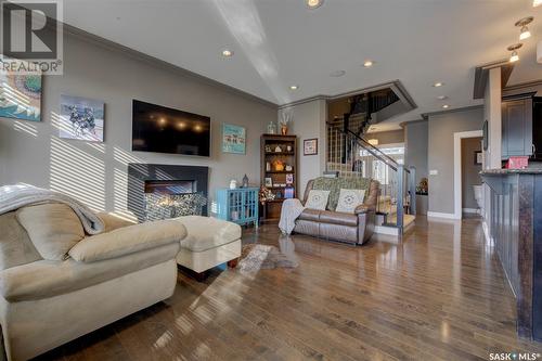 814 Rock Hill Lane, Martensville, SK - Indoor Photo Showing Living Room With Fireplace