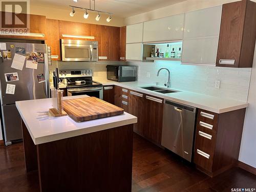 203 130 Phelps Way, Saskatoon, SK - Indoor Photo Showing Kitchen With Stainless Steel Kitchen With Double Sink With Upgraded Kitchen