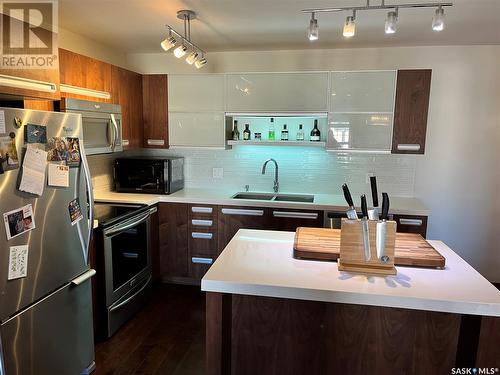 203 130 Phelps Way, Saskatoon, SK - Indoor Photo Showing Kitchen With Stainless Steel Kitchen With Double Sink With Upgraded Kitchen