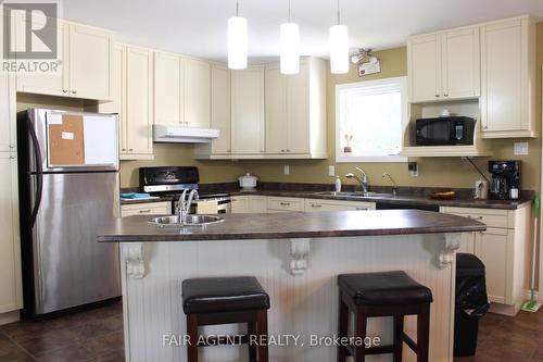 20232 Hwy 66 East, Larder Lake (Larder/Virginiatown), ON - Indoor Photo Showing Kitchen With Double Sink