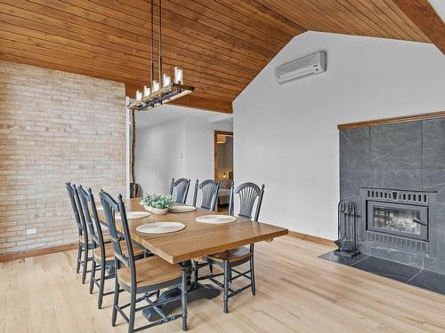 Dining room - 158 Rue De Bagot, Bromont, QC - Indoor Photo Showing Dining Room With Fireplace