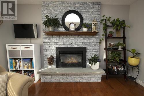 704 Third Lin E, Sault Ste. Marie, ON - Indoor Photo Showing Living Room With Fireplace