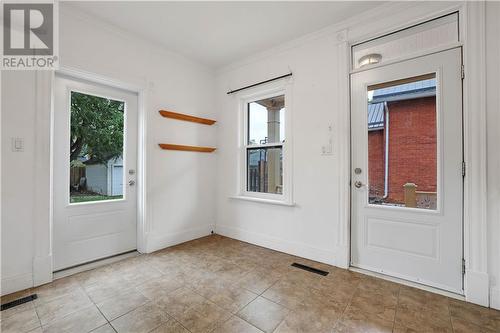 Kitchen features a door to back yard and deck, and a side door to covered porch. - 190 Lochiel Street S, Renfrew, ON - Indoor Photo Showing Other Room