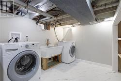 Laundry area in basement - 