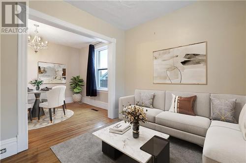 Virtually Staged Living Room - 190 Lochiel Street S, Renfrew, ON - Indoor Photo Showing Living Room