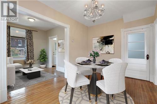 Virtually Staged Dining Room looking into Living Room - 190 Lochiel Street S, Renfrew, ON - Indoor Photo Showing Dining Room