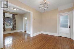 Virtually Staged Dining Room looking into Living Room - 