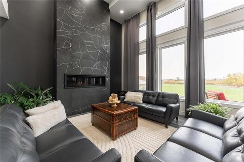 26 Prince Cove, East St Paul, MB - Indoor Photo Showing Living Room With Fireplace