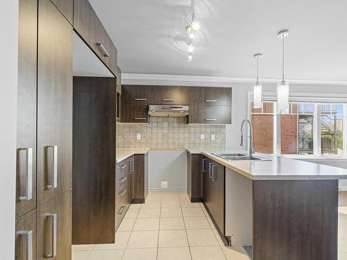 Kitchen - 2779 Rue Frégault, Laval (Chomedey), QC - Indoor Photo Showing Kitchen With Double Sink With Upgraded Kitchen