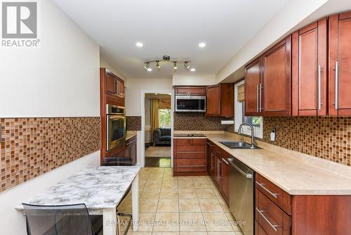 98 Church Street E, Brampton, ON - Indoor Photo Showing Kitchen With Double Sink