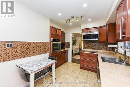 98 Church Street E, Brampton, ON - Indoor Photo Showing Kitchen With Double Sink