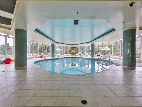 Piscine - 630-25 Prom. Des Îles, Laval (Chomedey), QC - Indoor Photo Showing Other Room With In Ground Pool