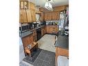 166 Cariboo Road, Kelowna, BC  - Indoor Photo Showing Kitchen With Double Sink 