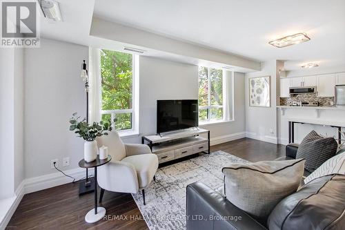 220 - 1733 Queen Street E, Toronto, ON - Indoor Photo Showing Living Room