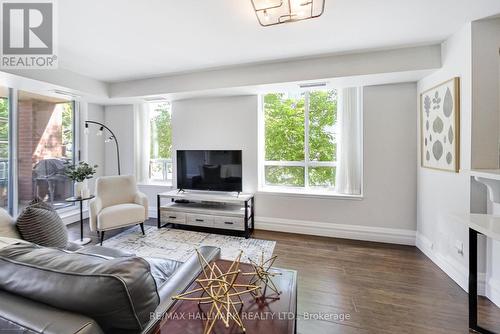 220 - 1733 Queen Street E, Toronto, ON - Indoor Photo Showing Living Room