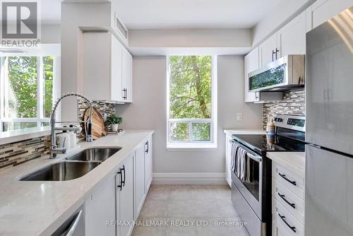 220 - 1733 Queen Street E, Toronto, ON - Indoor Photo Showing Kitchen With Double Sink With Upgraded Kitchen