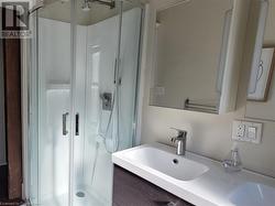 Bathroom has double sinks, shower and toilet - 