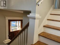 Stairs from the front entrance (main level) to the rest of the unit on the second floor - 