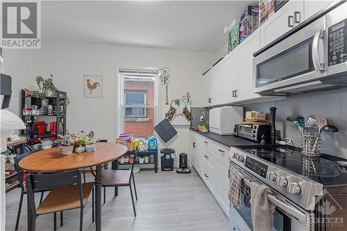 Unit #2 - updated Kitchen Cabinets - 128 Flora Street, Ottawa, ON - Indoor Photo Showing Kitchen