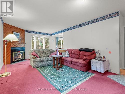 12 Bexhill Drive, London, ON - Indoor Photo Showing Living Room With Fireplace