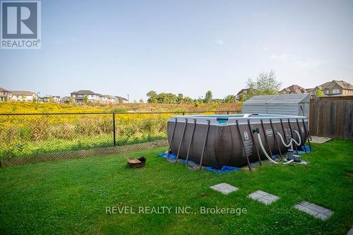 8 Turnbull Drive, Brantford, ON - Outdoor With Above Ground Pool