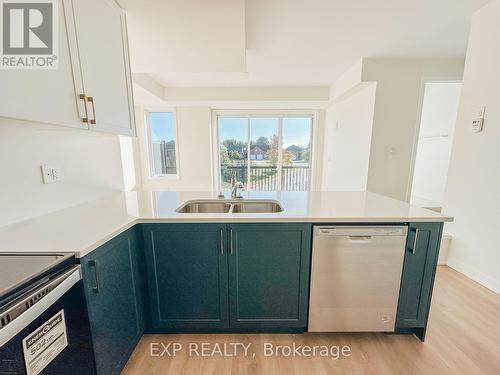 1504 - 160 Densmore Road, Cobourg, ON - Indoor Photo Showing Kitchen With Double Sink