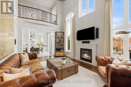 24 Bluff Trail, King, ON - Indoor Photo Showing Living Room With Fireplace