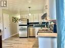 33 Aéroport Street, Edmundston, NB  - Indoor Photo Showing Kitchen With Double Sink 